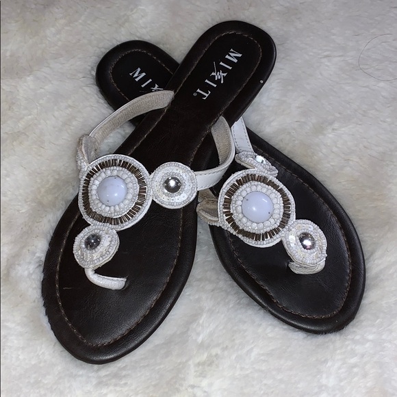 white embellished flip flops